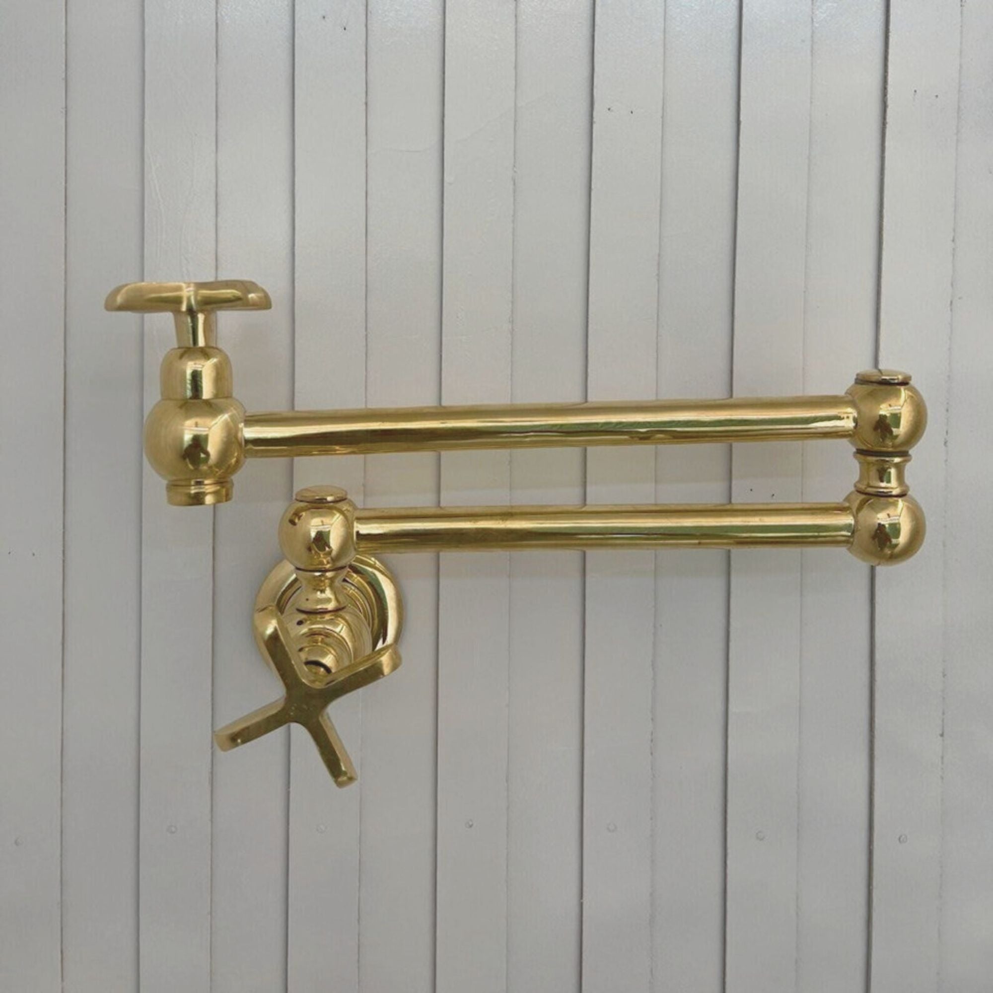 Elegant Unlacquered Brass Pot Filler for a Timeless Kitchen Touch