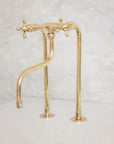 Elegant Unlacquered Brass Kitchen Faucet with Tall Legs and Unique Elephant Trunk Spout - BRASSMA