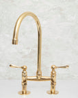 Elegant Unlacquered Brass Kitchen Bridge Faucet with Stylish Lever Handles - BRASSMA