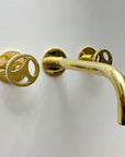 Unlacquered Brass Wall Mounted Faucet With Wheel Handles