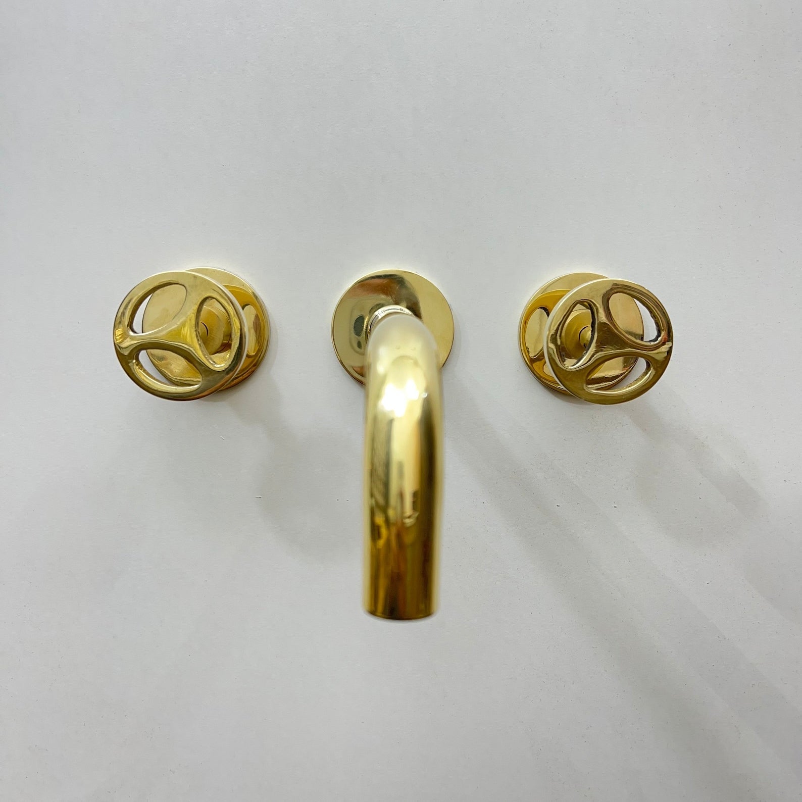 Unlacquered Brass Wall Mounted Faucet With Wheel Handles