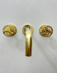 Unlacquered Brass Wall Mounted Faucet With Wheel Handles