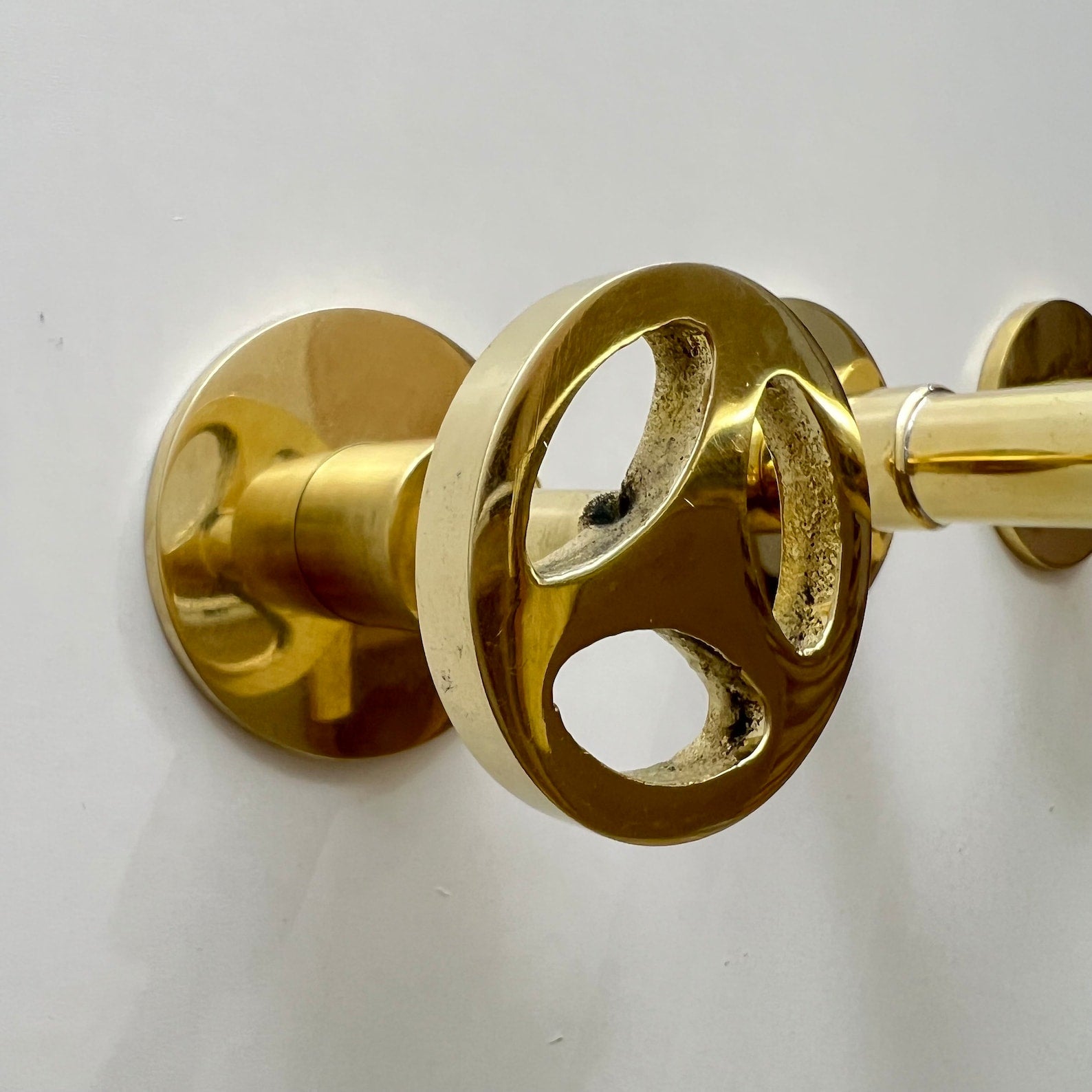 Unlacquered Brass Wall Mounted Faucet With Wheel Handles