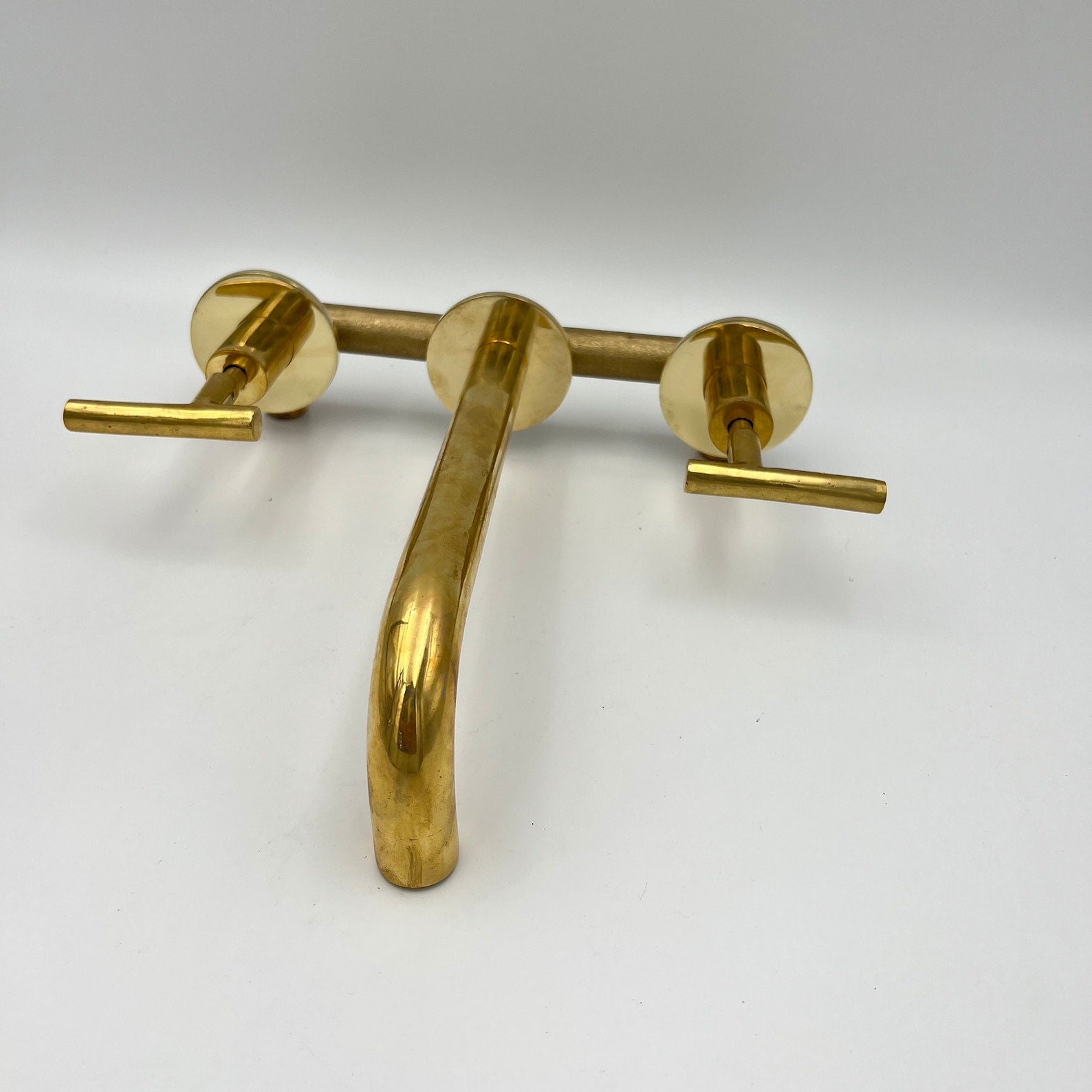 Unlacquered Brass Bathroom Faucet With Lever Handles