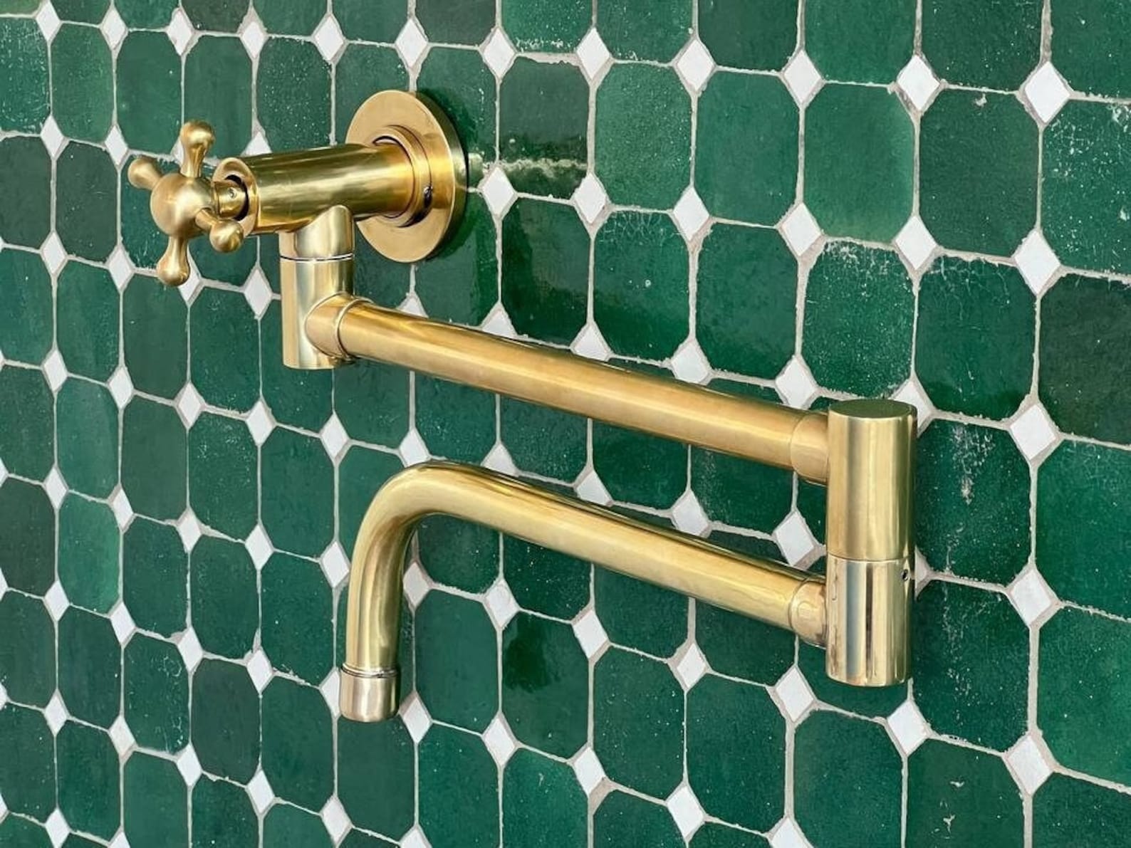 Elegant Unlacquered Brass Pot Filler for a Timeless Kitchen Look