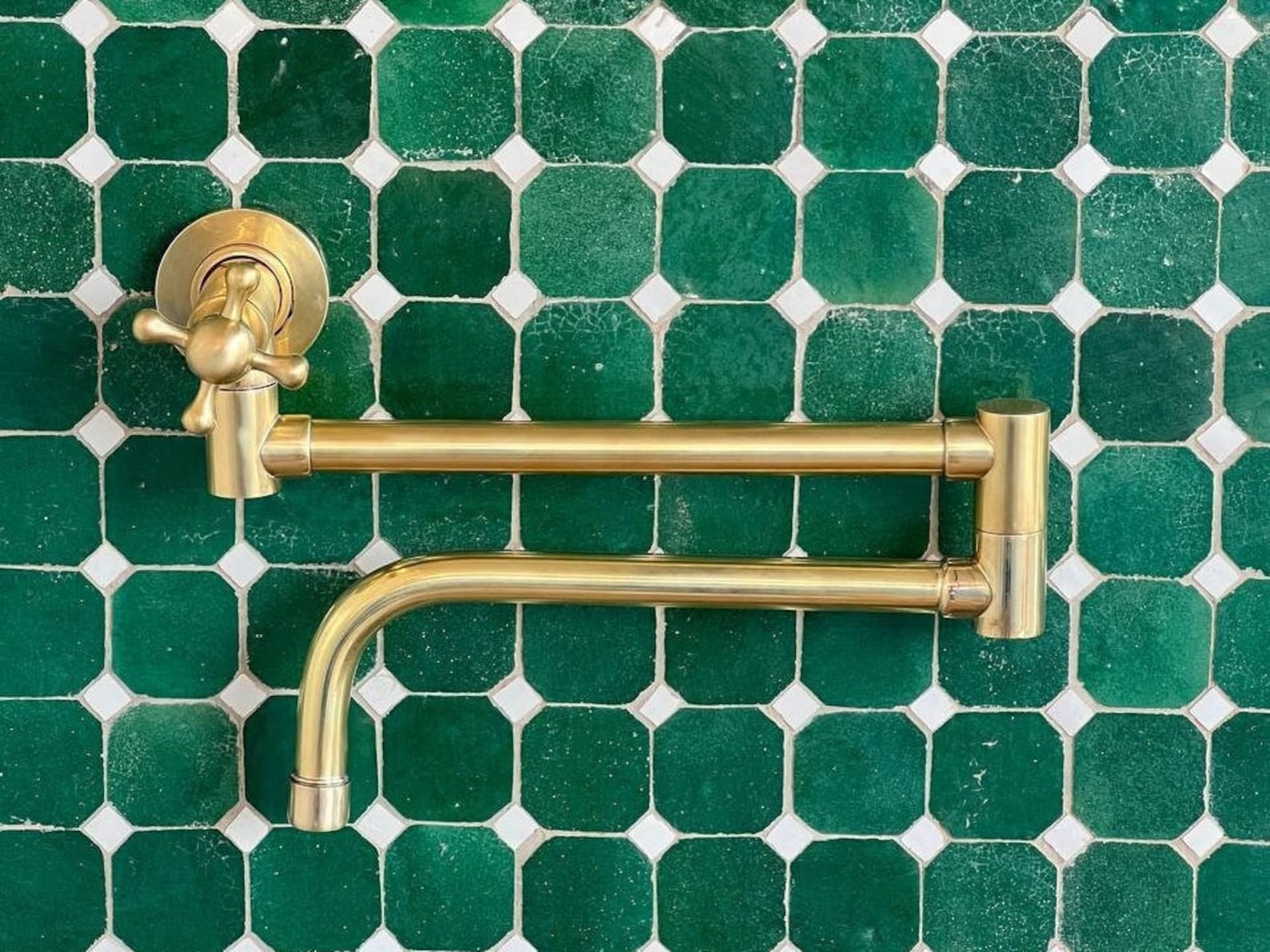 Elegant Unlacquered Brass Pot Filler for a Timeless Kitchen Look