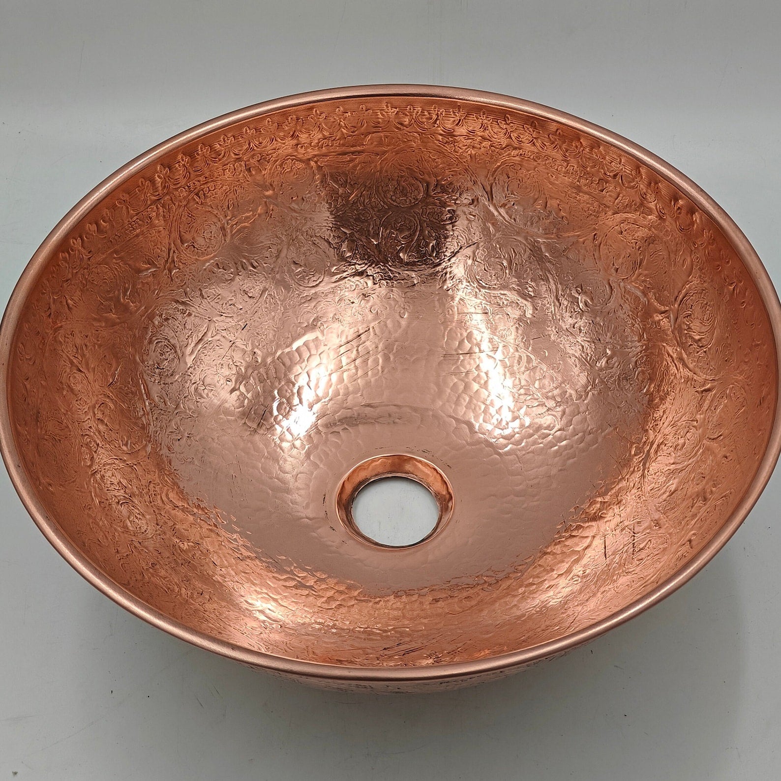 Engraved copper bathroom sink