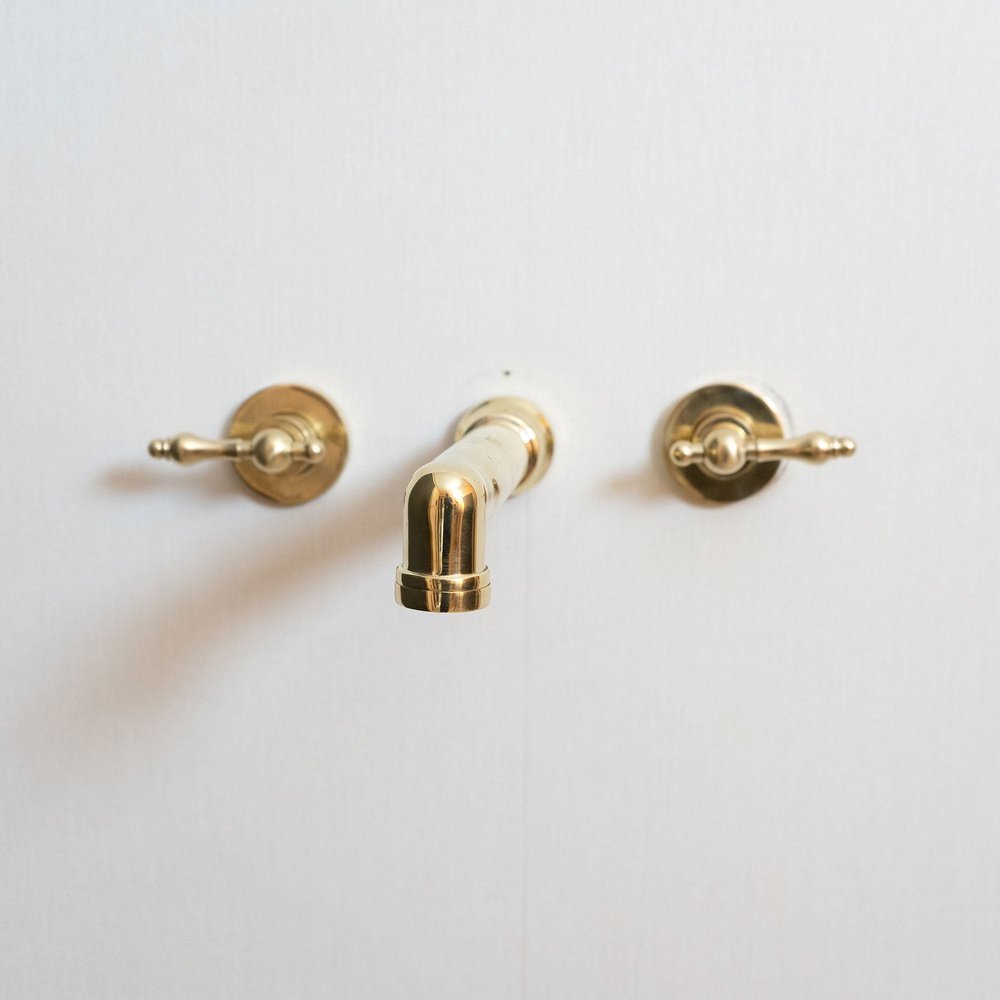 Unlacquered Brass Wall Mounted Faucet With Lever Handles