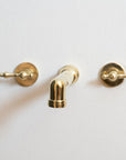 Unlacquered Brass Wall Mounted Faucet With Lever Handles