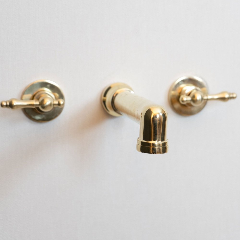 Unlacquered Brass Wall Mounted Faucet With Lever Handles