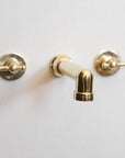 Unlacquered Brass Wall Mounted Faucet With Lever Handles