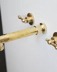 Unlacquered Brass Wall Mounted Faucet With Lever Handles