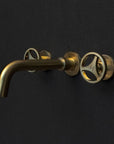 Unlacquered Brass Wall Mounted Faucet With Round Handles